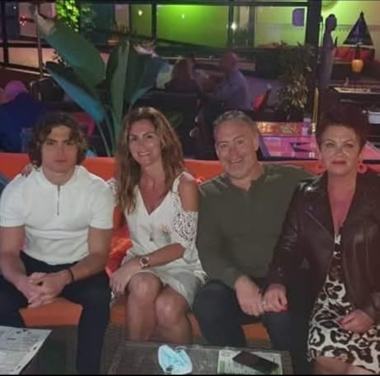 Family and friends seated together