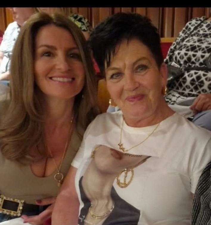 Christie and Trisha smiling together